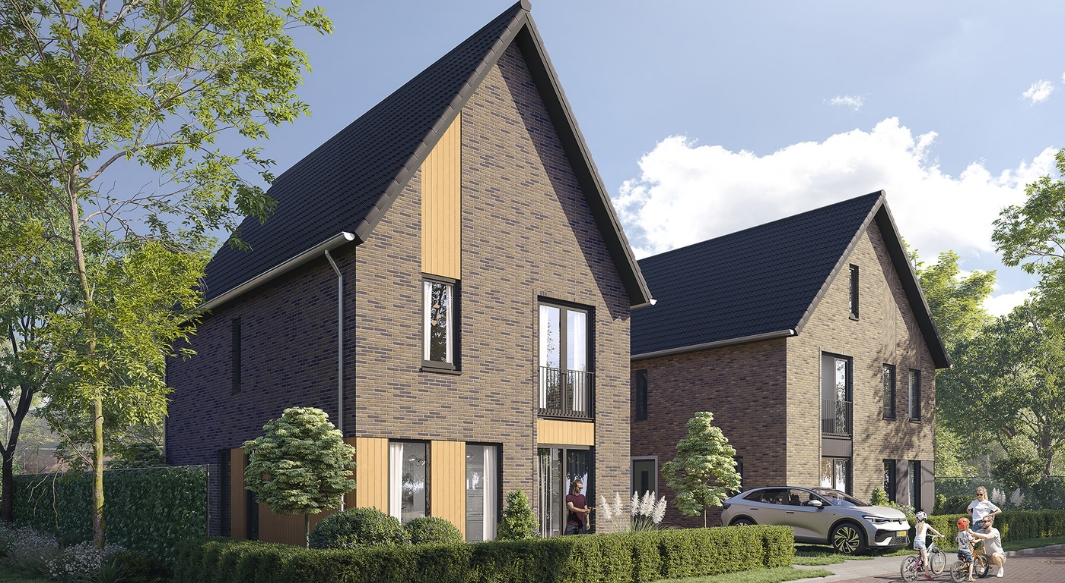Deze vrijstaande woning combineert baksteen met houten accenten